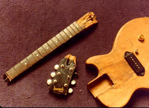 Early Les Paul Junior. Click image to see repairs.